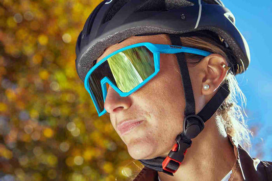 Cycling Glasses: Inside or Outside the Helmet Straps?