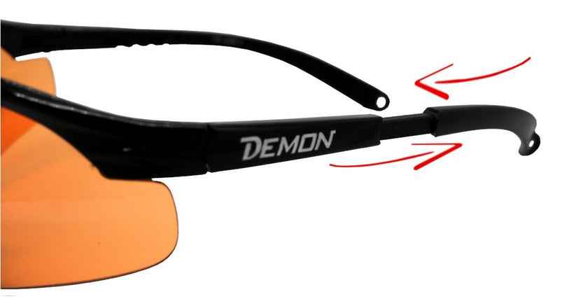 Brazo ajustable para gafas de running y trail con lentes naranjas.