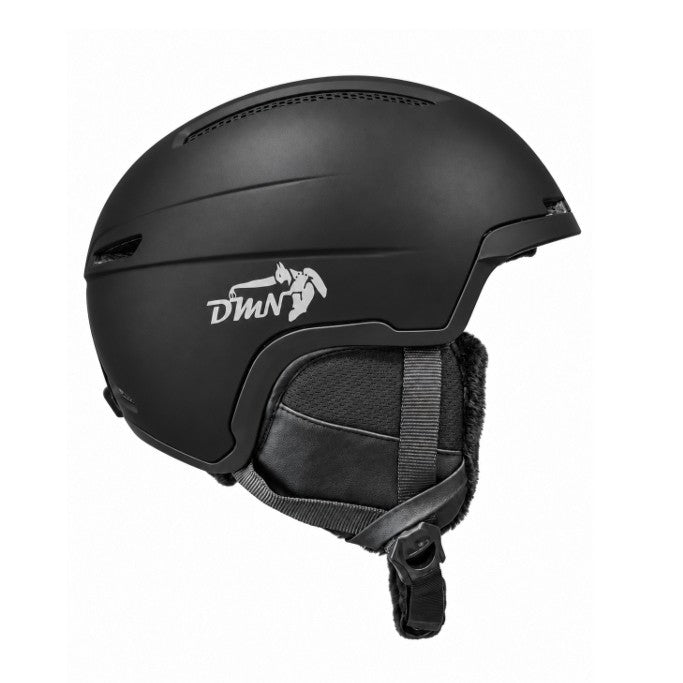 Side profile of DMN NIVAL lightweight In-Mould snowboard helmet in matte black, with integrated airflow vents and padded ear protection.