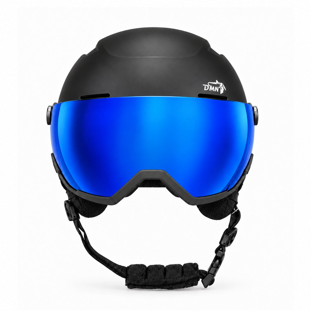 Front view of DMN NIVAL-V matte black ski helmet with integrated REVO Mirror Blue visor, category S2 and 28% VLT for skiing and snowboarding.