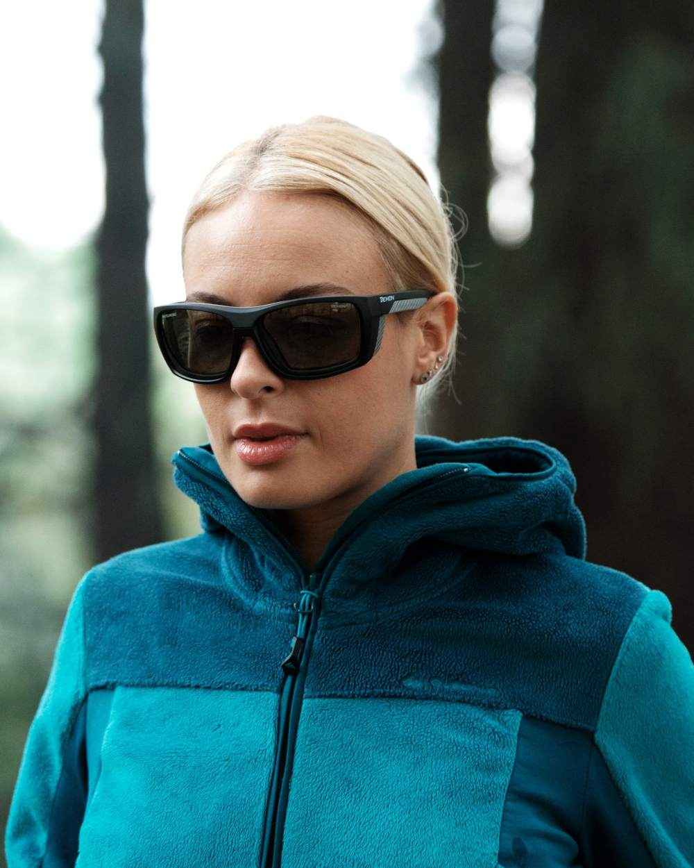 woman mountain glasses with photochromic lenses 2 4 for mountaineering and ski mountaineering eiger model